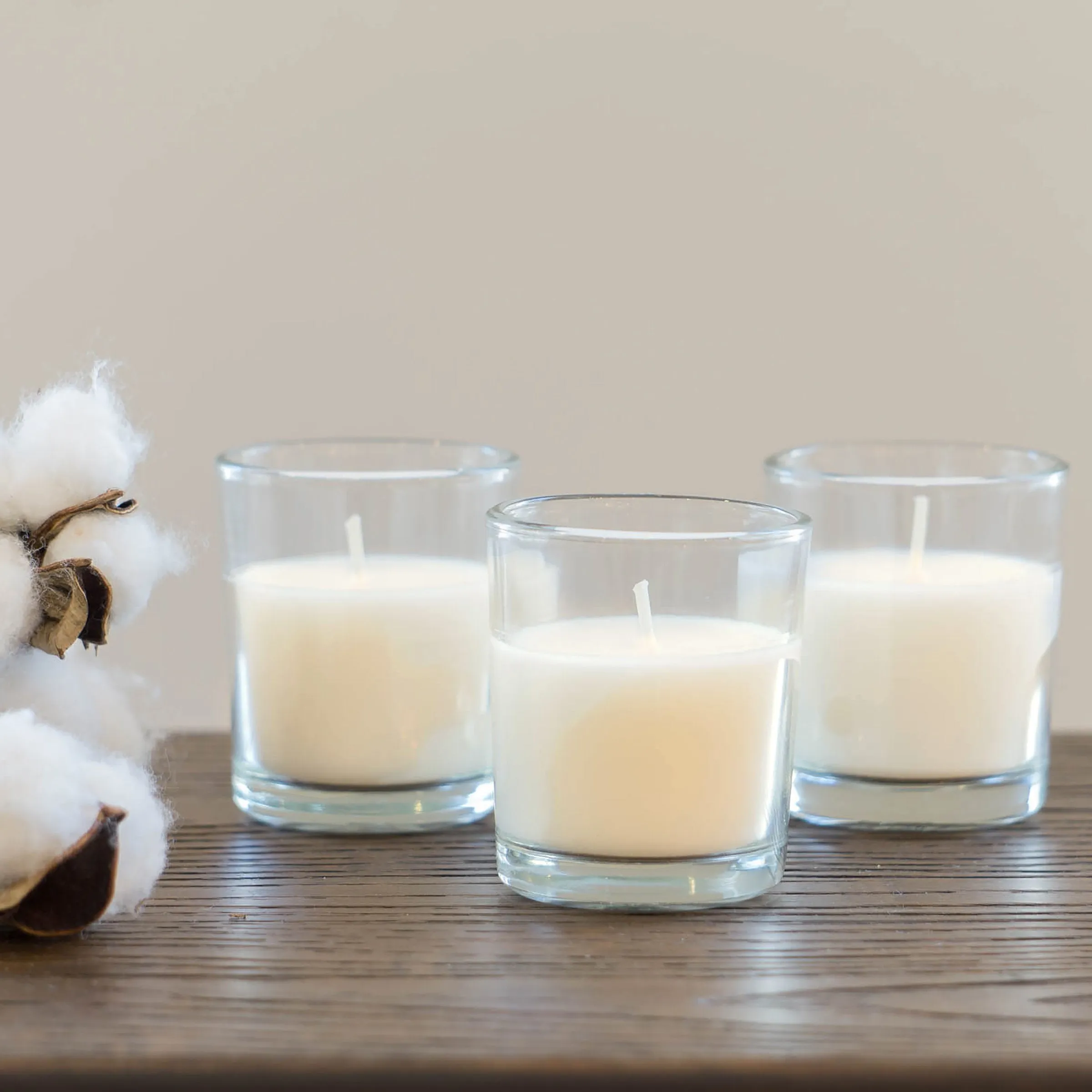 48-Pack Unscented Long Burning Clear Glass Ivory Wax Filled Votive Candles (WS)