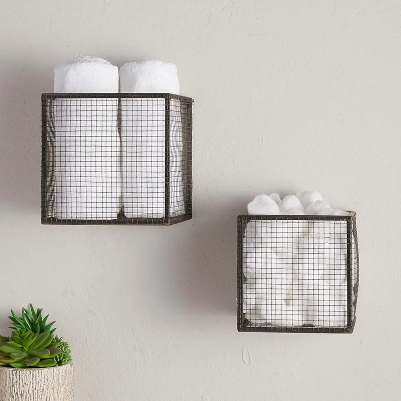Black metal wall mounted basket